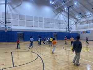 students playing in gym