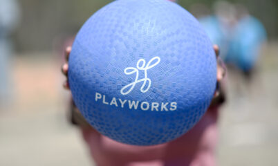 kickball with Playworks logo