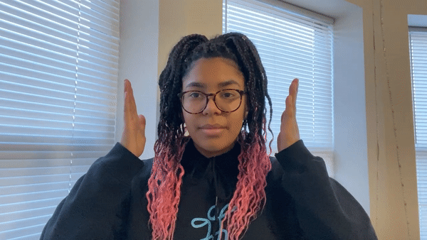 gif of person miming bumble bee buzzing