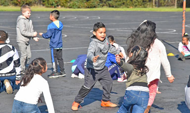 kids playing on blacktop