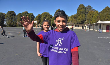 junior coaches smiling