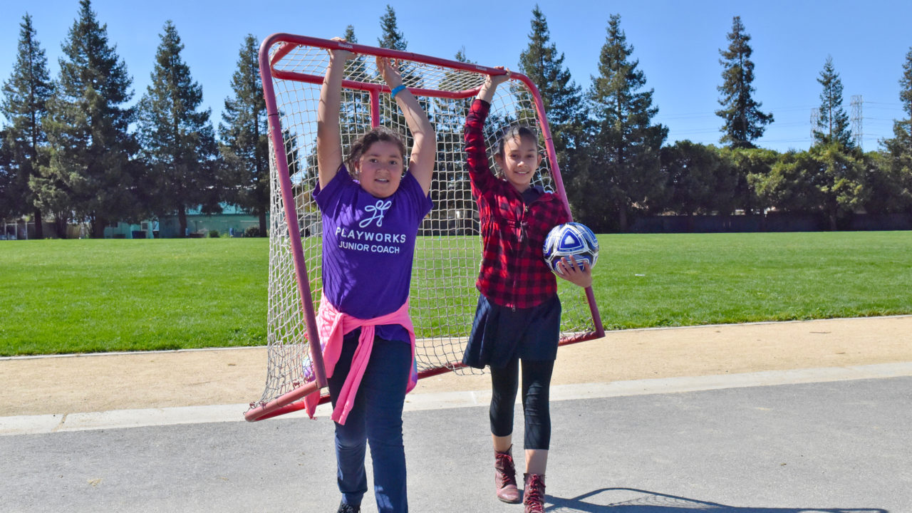 Playworks students set up a soccer game. If you don't have a goal, cones work too.