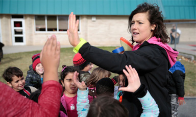 coach giving high fives