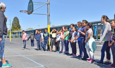 coach instructing students