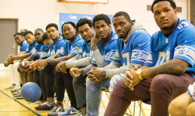 Detroit Lions players at school