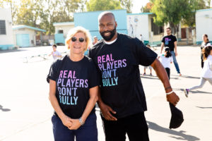 stars wearing Real Players Don't Bully shirt