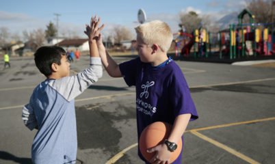 kids giving high-five