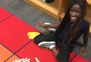 girl playing indoor recess