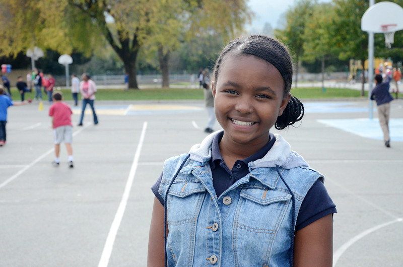 girl smiling at recess