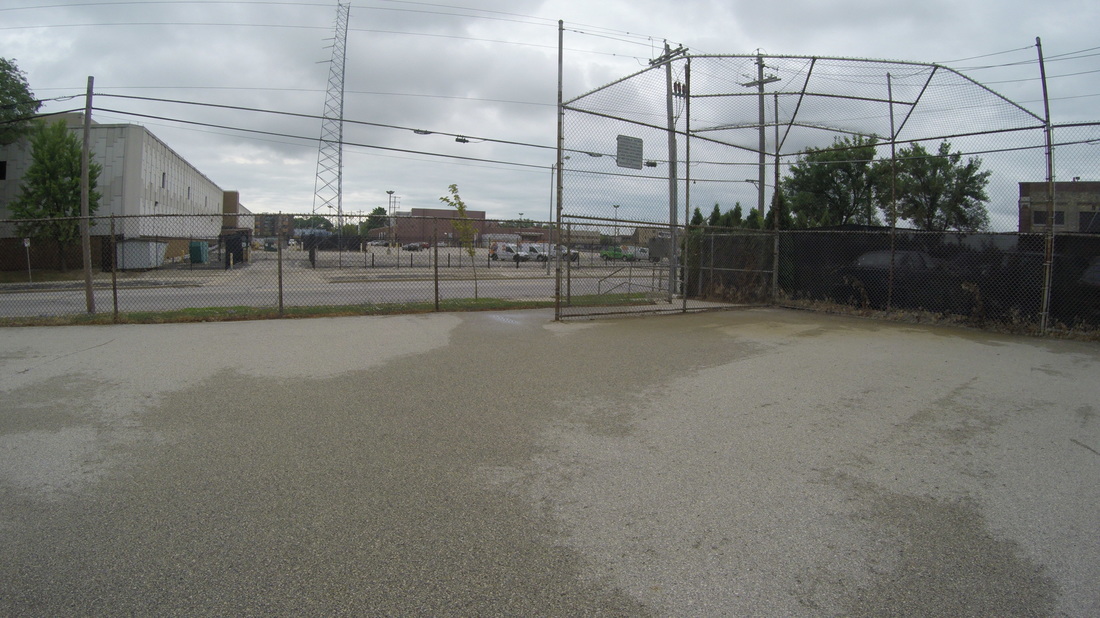 Large blacktop far from school