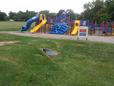 drain at entrance to playground 