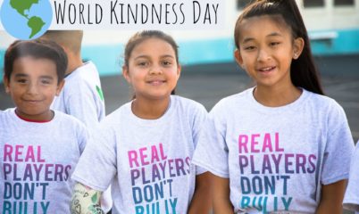 three kids with text "world kindness day"