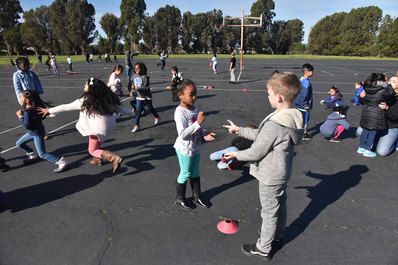 students playing on blacktop