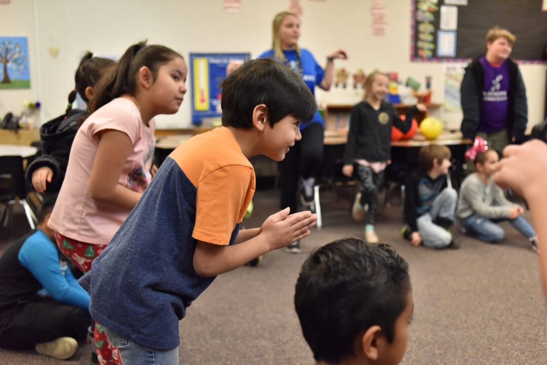 students playing game in classroom