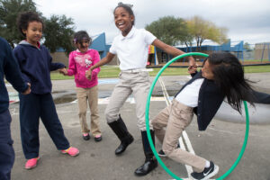 Kids playing with hula hoops