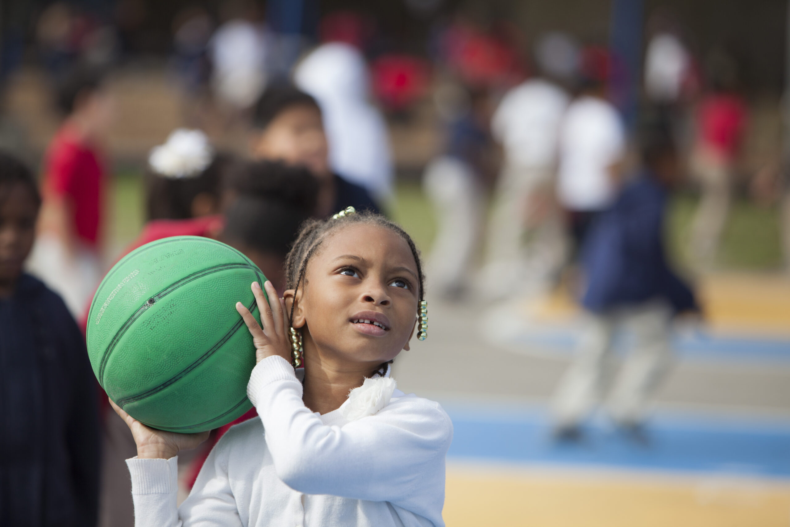 child with a basketball